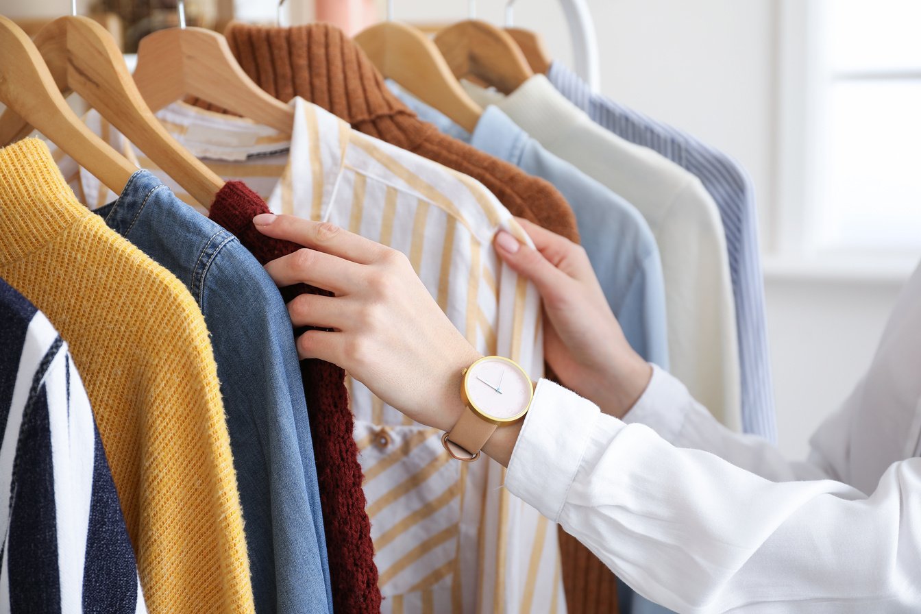 Female Clothes Stylist Working in Office, Closeup