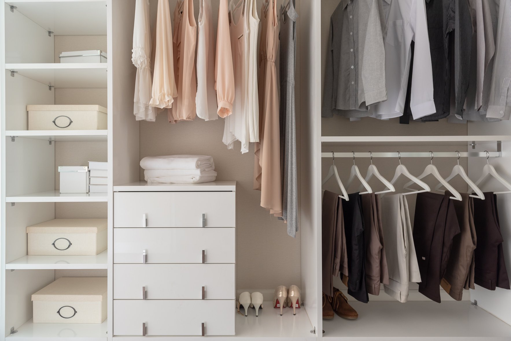 modern closet with clothes